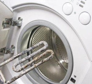 How to clean a washing machine from scale