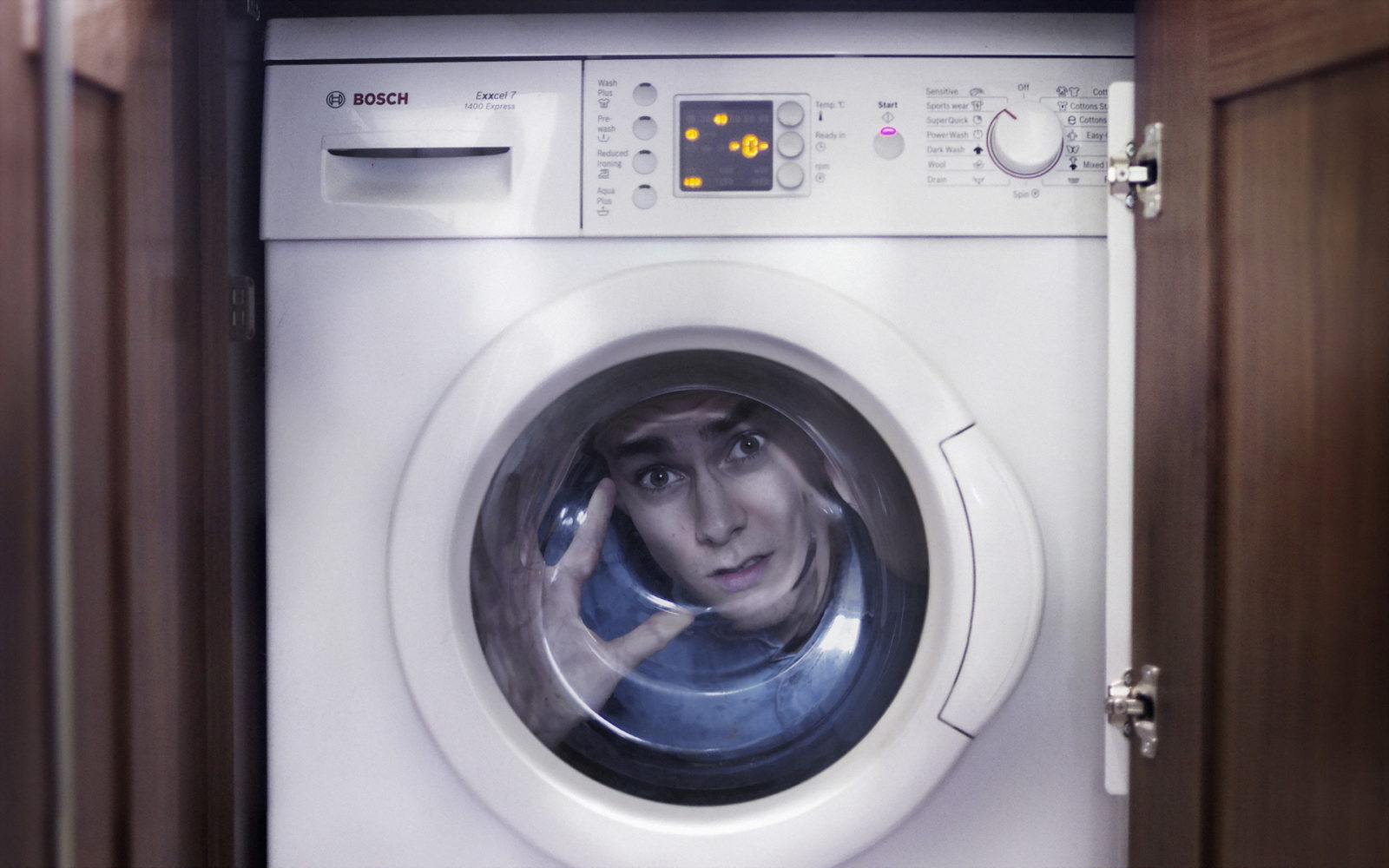 hur man öppnar maskinen medan man tvättar