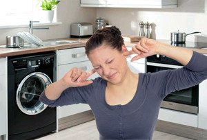 The washing machine whistles when washing