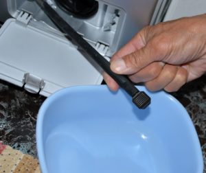 vidanger l'eau de la machine à laver