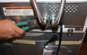 Conectando a máquina de lavar à água quente