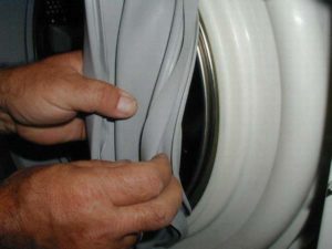 Hvordan bytte mansjetten på en Ariston vaskemaskin