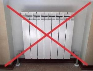 Nesušte rohož na radiátoru