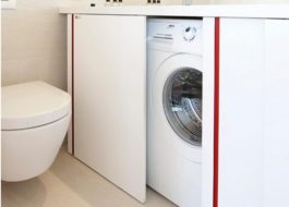 Hoe een wasmachine in de badkamer te verbergen