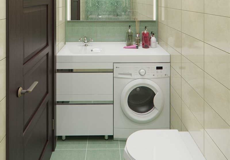 wasmachine onder aanrecht in badkamer