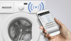 For at aktivere modulet skal du tage din smartphone med til vaskemaskinen 