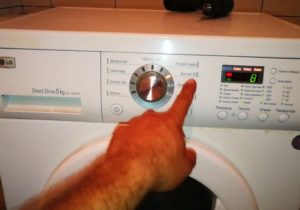 How to turn on the water drain in an LG washing machine