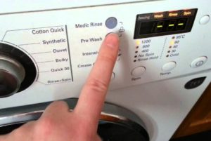 Hvordan slå av en LG vaskemaskin mens du vasker?
