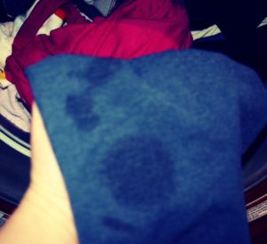 Taques de greix a la roba després del rentat