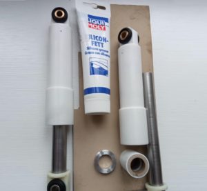 How to lubricate the shock absorbers of a washing machine?