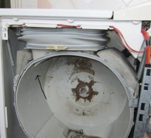 Bagaimana untuk membuka dan membersihkan mesin basuh?
