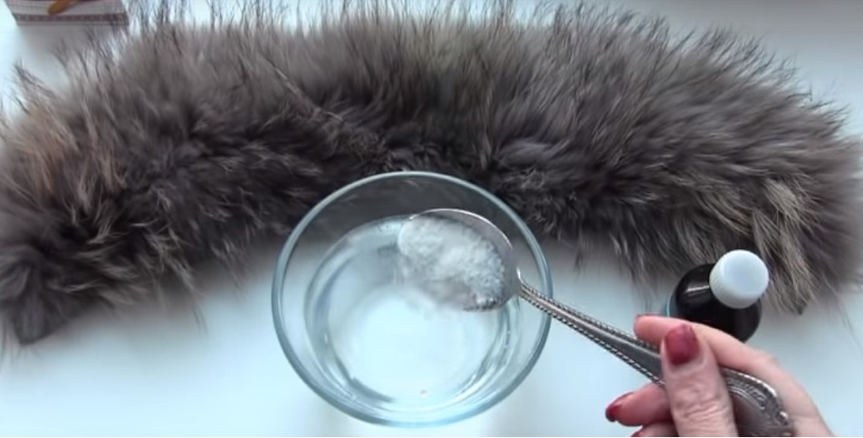 cleaning the fur from a jacket
