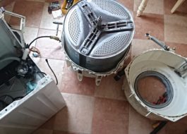 So entfernen Sie die Trommel einer Kandy-Waschmaschine