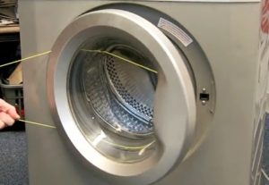 Hur öppnar man Kandy tvättmaskinsdörr?
