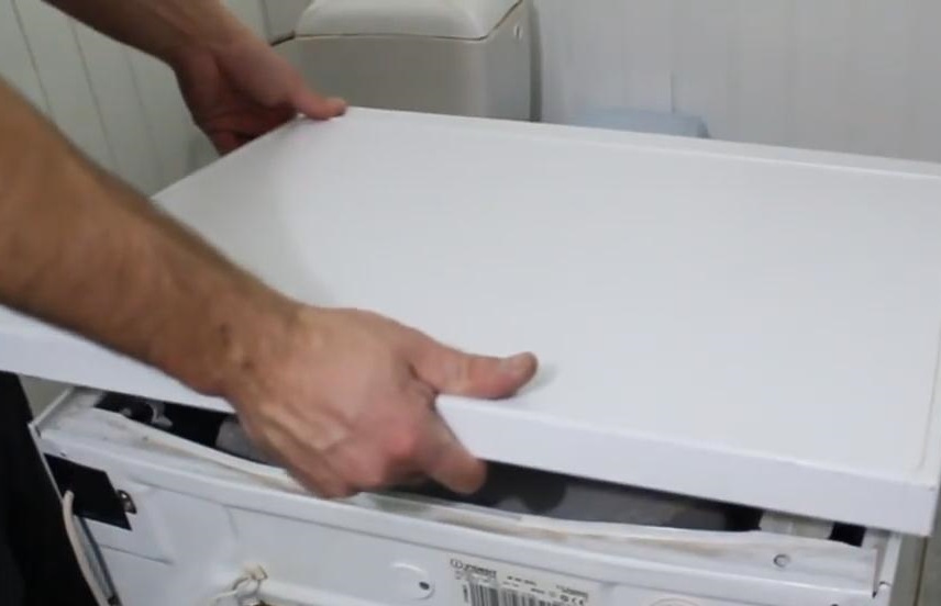 How to open the top cover of an Ardo washing machine
