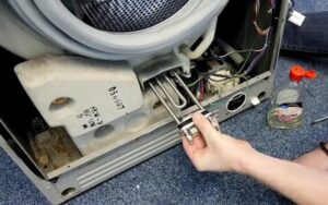 Làm cách nào để thay đổi bộ phận làm nóng trên máy giặt Vestel?