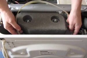 Hvordan skifte belte på en Vestel vaskemaskin?