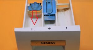Où verser la poudre dans une machine à laver Siemens ?