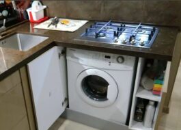Är det möjligt att placera en spishäll ovanför en tvättmaskin?
