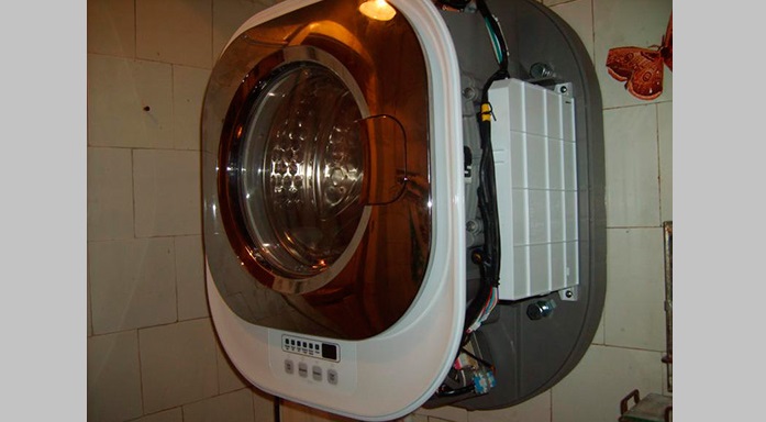 wasmachine aan de muur