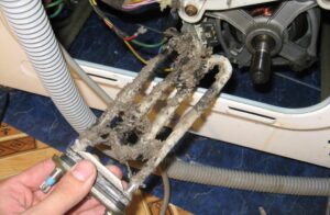 Hoe het verwarmingselement uit een LG-wasmachine te verwijderen