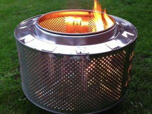 Com fer una llar de foc amb un tambor de rentadora?