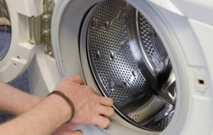 The washing machine motor hums but does not turn
