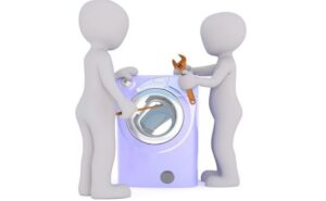 Krakšķoša skaņa veļas mašīnā, kad trumulis griežas