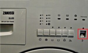 O botão liga / desliga da máquina de lavar está preso