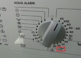 Vad betyder järnskylten på en tvättmaskin?