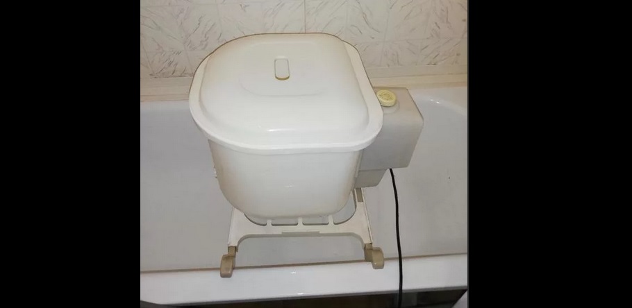 halvautomatisk maskin i badekaret