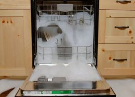 Why is foam leaking from the dishwasher?