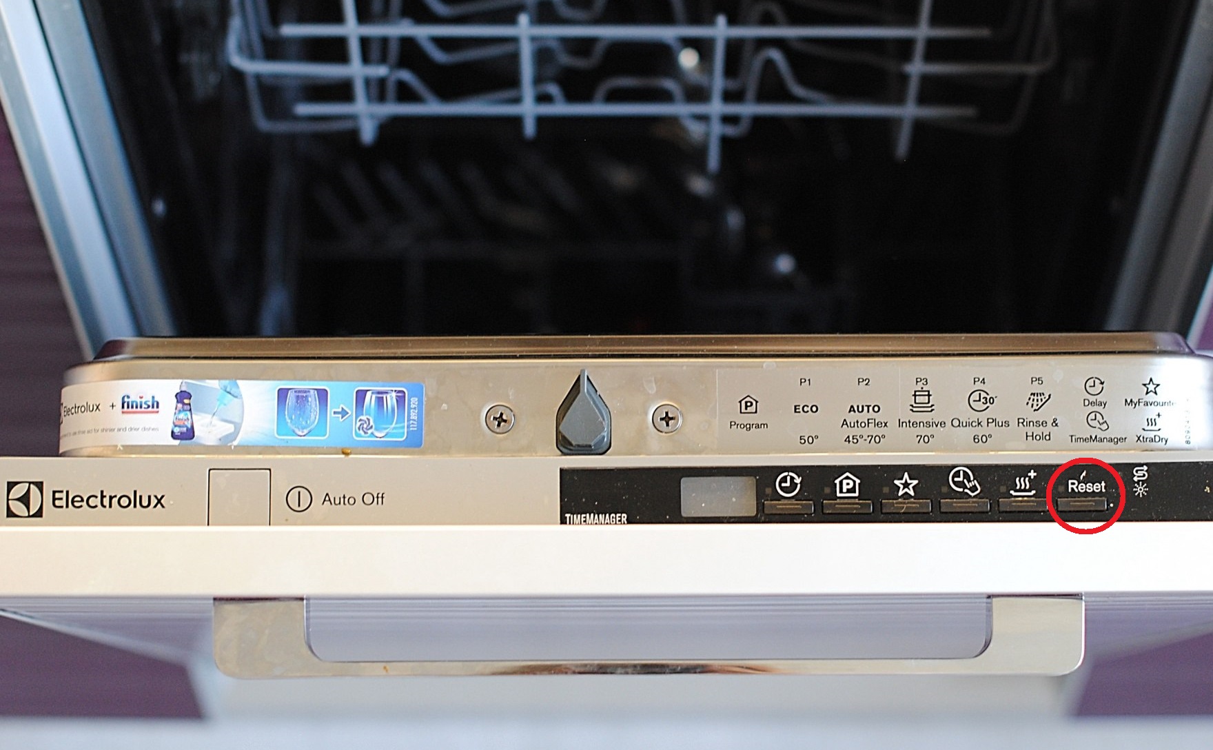 How to reset the program on an Electrolux dishwasher