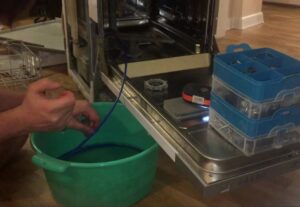 How to drain water from an Electrolux dishwasher