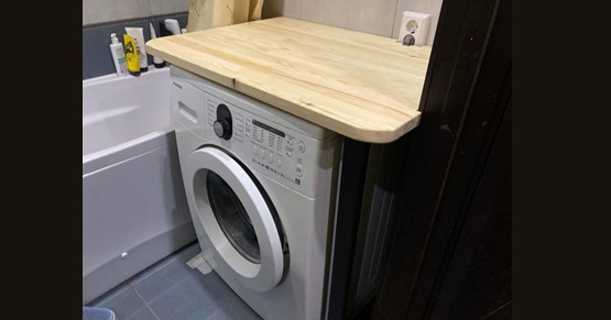 hemgjord produkt för att installera en torktumlare ovanför en tvättmaskin