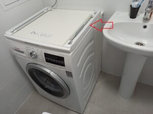 How to put a dryer on a narrow washing machine?