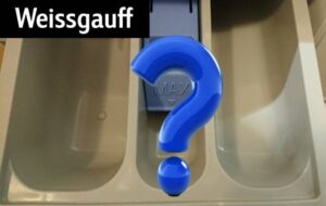 Hvor å helle pulver i en Weissgauff vaskemaskin