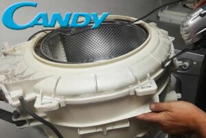 Hoe een niet-scheidbare trommel van een Candy-wasmachine te demonteren