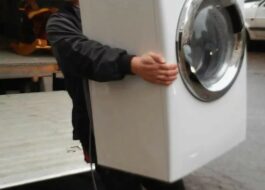 Cómo levantar una secadora solo