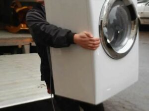 How to lift a dryer alone